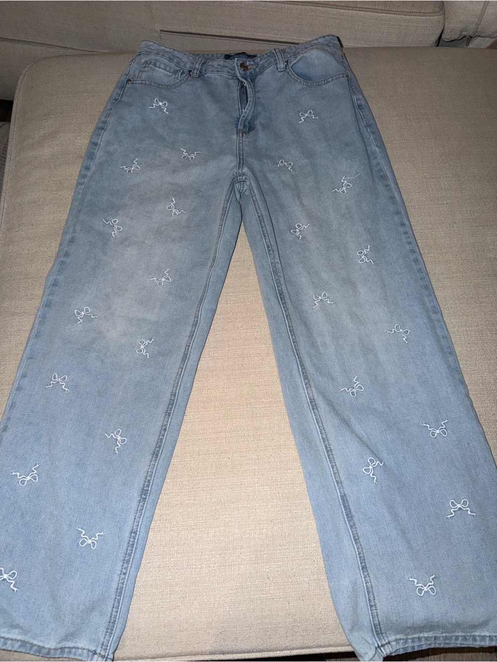 Light Wash Straight-Leg Jeans with White Embroidered Accents